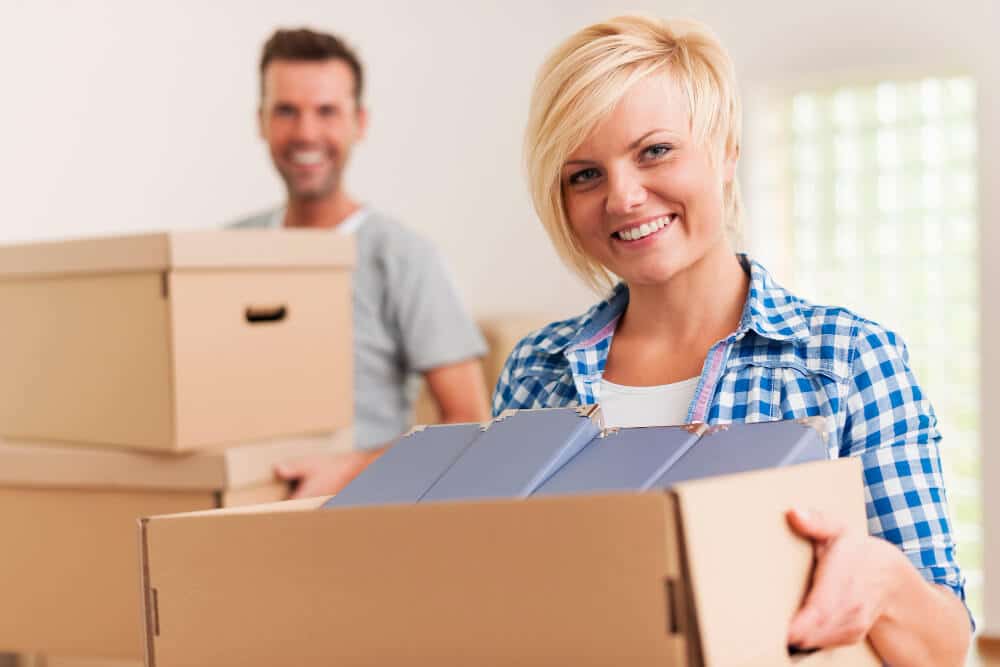 smiling-woman-during-moving-house